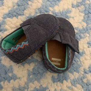 Baby Toms and. Converse shoes